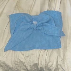 Blue top.